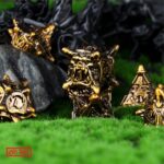 Polydice Monstrous Gold - Metaal - 7 stuks - Inclusief dice bag - Goudkleurig