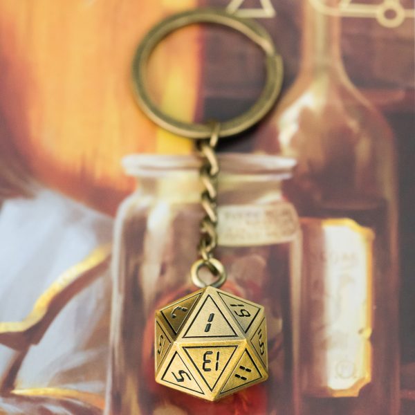 Lapi Toys - DnD D20 sleutelhanger Golden Guild - Dungeons and dragons metalen dobbelsteen - Afneembaar - Metaal - Goud